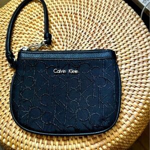 Calvin Klein black zip wristlet pouch with sparkly CK lettering